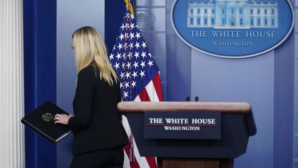 White House press secretary Kayleigh McEnany departs after delivering a statement at the White House, Thursday, Jan. 7, 2021, in Washington. (AP Photo/Patrick Semansky) White House press secretary Kayleigh McEnany departs after delivering a statement at the White House, Thursday, Jan. 7, 2021, in Washington. (AP Photo/Patrick Semansky) - Sputnik International