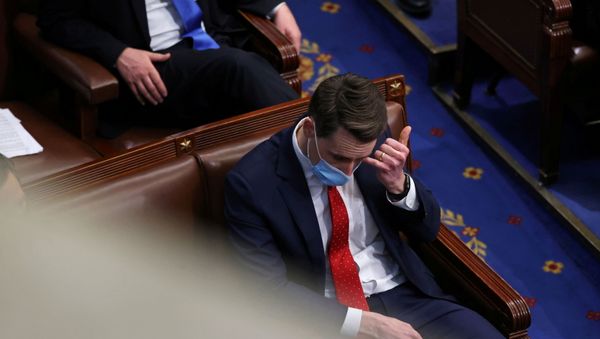 Senator Josh Hawley (R-MO) attends a joint session of Congress after they reconvened to certify the Electoral College votes of the 2020 presidential election in the House chamber in Washington, U.S. January 7, 2021. - Sputnik International