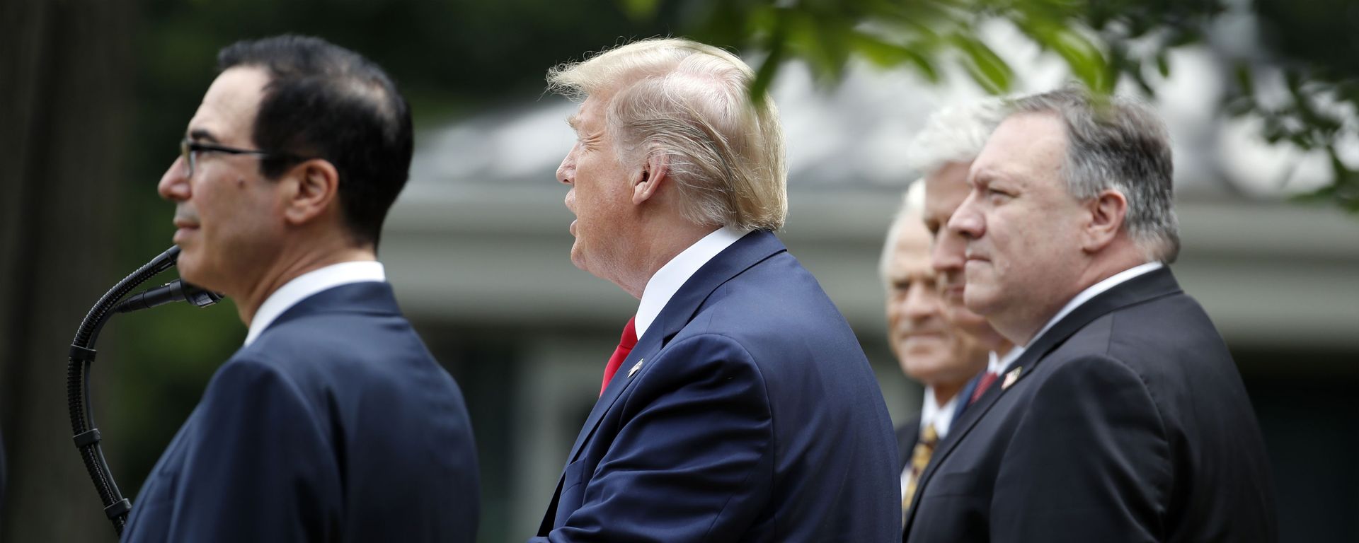 President Donald Trump speaks in the Rose Garden of the White House, Friday, May 29, 2020, in Washington, as from left, Treasury Secretary Steven Mnuchin, White House trade adviser Peter Navarro, left, White House national security adviser Robert O'Brien, and Secretary of State Mike Pompeo, listen - Sputnik International, 1920, 18.09.2021
