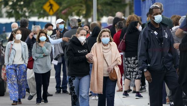 In this Jan. 6, 2021, file photo, people arrive at Jackson Memorial Hospital to receive the COVID-19 vaccine in Miami.  - Sputnik International
