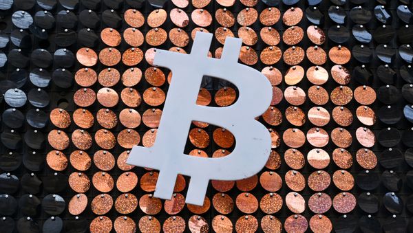 The logo of Bitcoin digital currency is pictured on the front door of an ATM in Marseille, southern France, on January 8, 2021. - Sputnik International