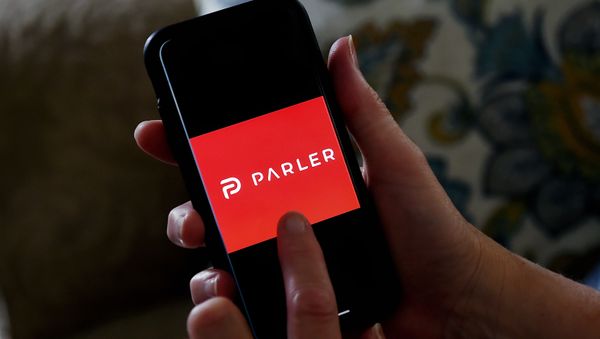 This illustration file photo taken on July 2, 2020 shows social media application logo Parler displayed on a smartphone in Arlington, Virginia. - Sputnik International