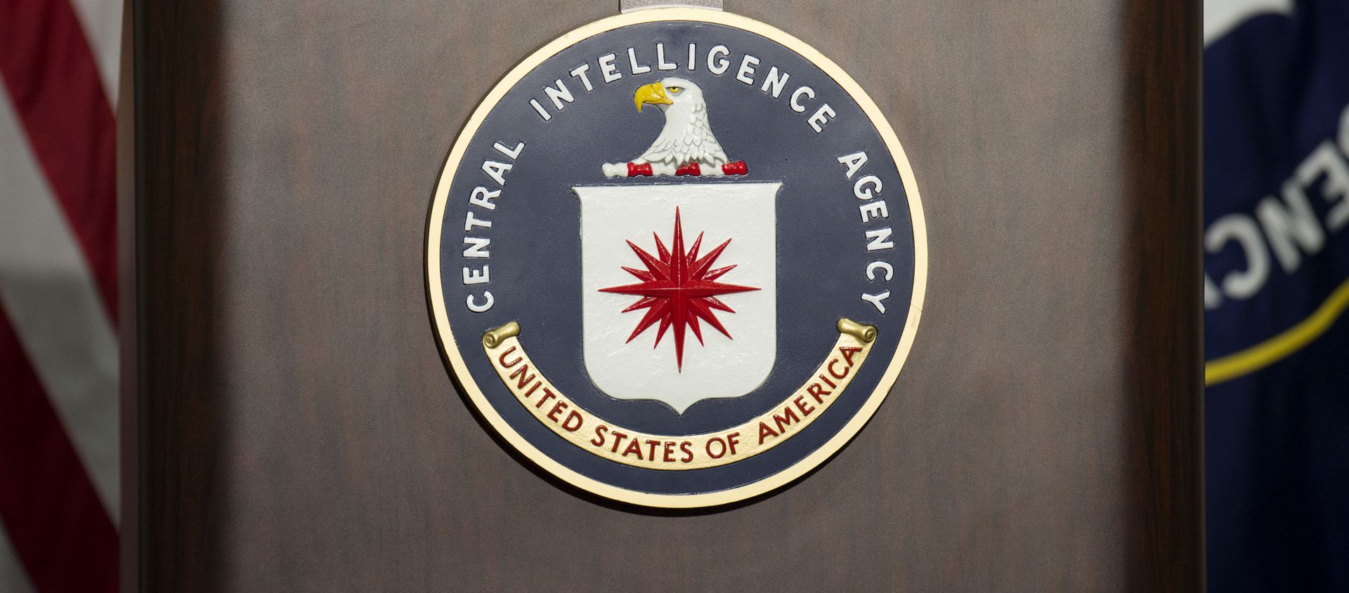 The lectern with CIA logo stands empty as reporters await the arrival of Director of Central Intelligence Agency John Brennan for a press conference at CIA headquarters in Langley, Virginia, December 11, 2014. The lectern with CIA logo stands empty as reporters await the arrival of Director of Central Intelligence Agency John Brennan for a press conference at CIA headquarters in Langley, Virginia, December 11, 2014. - Sputnik International, 1920, 21.01.2021