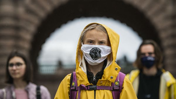 Swedish climate activist Greta Thunberg protests during a Fridays for Future protest in front of the Swedish Parliament Riksdagen in Stockholm on October 9, 2020 - Sputnik International