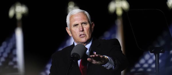 In this Oct. 28, 2020, file photo Vice President Mike Pence speaks at a campaign event in Flint, Mich. A group of Democratic lawmakers on Monday, Nov. 2, called on the Trump administration to stop the expulsion of unaccompanied children and other asylum seekers at the U.S. border using emergency powers granted during the coronavirus pandemic. In this Oct. 28, 2020, file photo Vice President Mike Pence speaks at a campaign event in Flint, Mich. A group of Democratic lawmakers on Monday, Nov. 2, called on the Trump administration to stop the expulsion of unaccompanied children and other asylum seekers at the U.S. border using emergency powers granted during the coronavirus pandemic. - Sputnik International