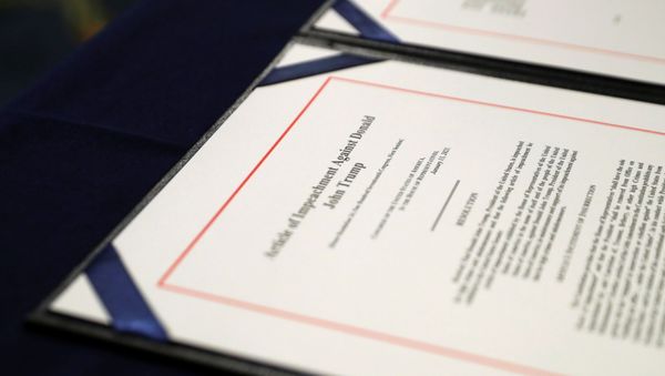A close-up view of the article of impeachment against U.S. President Donald Trump, which U.S. House Speaker Nancy Pelosi (D-CA) will sign in an engrossment ceremony, at the U.S. Capitol in Washington January 13, 2021 - Sputnik International