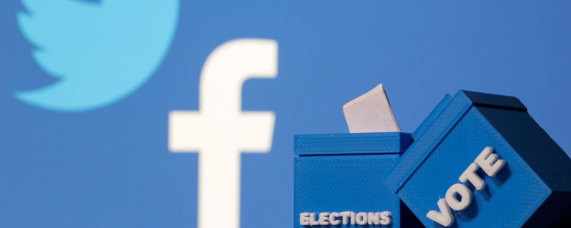 3D-printed ballot boxes are seen in front of displayed Facebook and Twitter logos in this illustration taken November 4, 2020 3D-printed ballot boxes are seen in front of displayed Facebook and Twitter logos in this illustration taken November 4, 2020 - Sputnik International, 1920, 14.01.2021