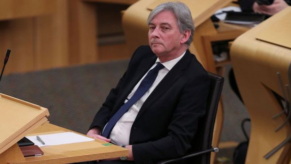 Leader of the Scottish Labour Party Richard Leonard listens as Scottish First Minister Nicola Sturgeon speaks at the Holyrood parliament, as the spread of the coronavirus disease (COVID-19) continues, in Edinburgh, Scotland, Britain, 22 December 2020. REUTERS/Russell Cheyne/Pool - Sputnik International