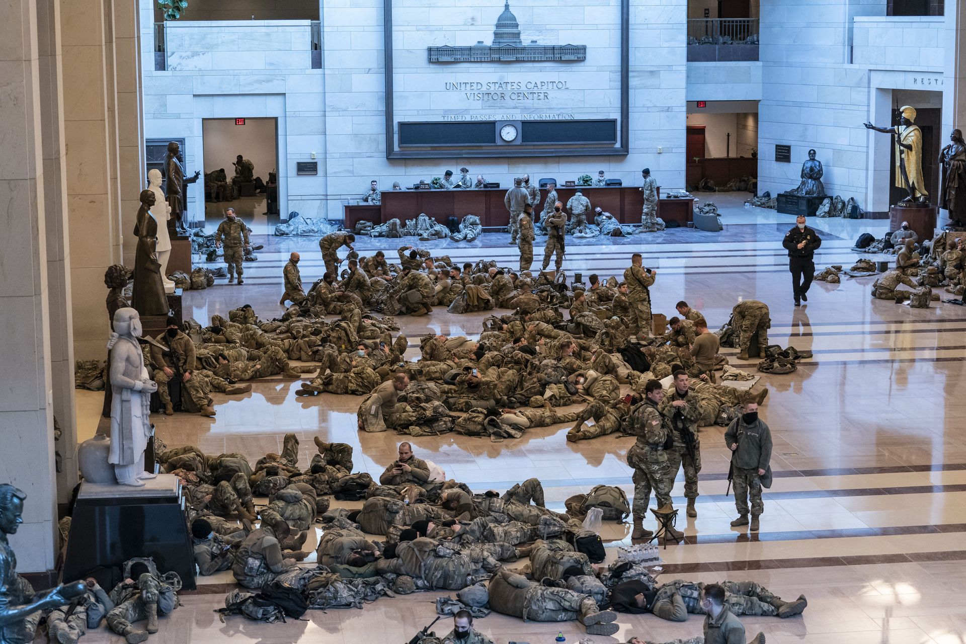 Hundreds of National Guard troops hold inside the Capitol Visitor's Center to reinforce security at the Capitol in Washington, Wednesday, Jan. 13, 2021.  - Sputnik International, 1920, 08.09.2021