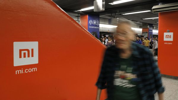 An advertisement for Xiaomi is displayed at a subway station in Hong Kong Monday, July 9, 2018 - Sputnik International