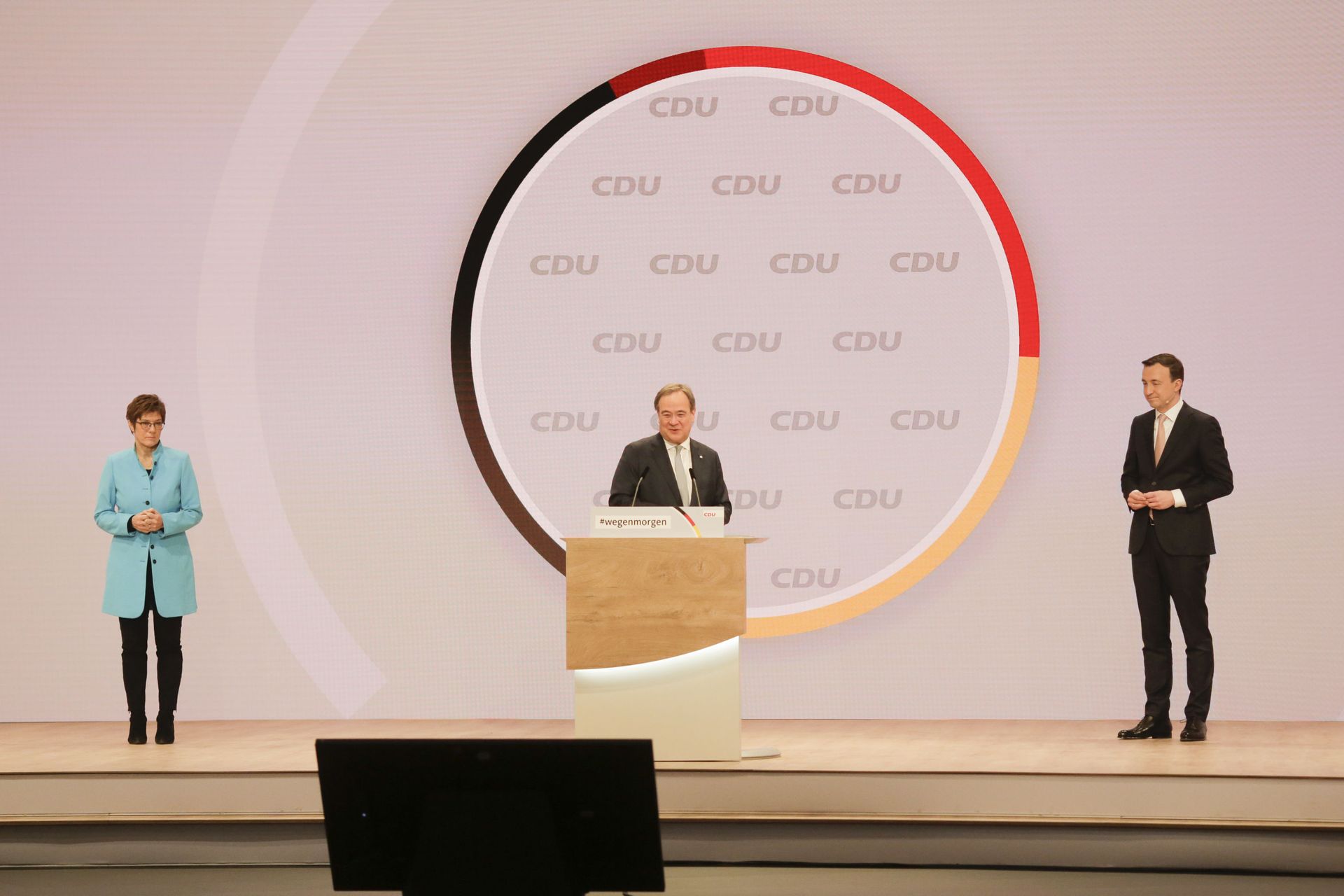 The new elected Christian Democratic Union, CDU, party chairman Armin Laschet, center, speaks as outgoing chairwoman Annegret Kramp-Karrenbauer, left, and Secretary General Paul Ziemiak listen, after the voting at a digital party convention in Berlin, Germany, Saturday, Jan. 16, 2021. The party of German Chancellor Angela Merkel decided on a successor for the outgoing chairwoman Annegret Kramp-Karrenbauer, left, at the convention. - Sputnik International, 1920, 07.09.2021