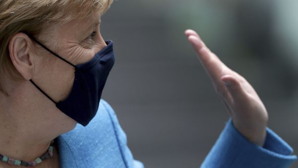 German Chancellor Angela Merkel waves as she leaves after her annual summer press conference in Berlin, Germany, Friday, Aug. 28, 2020 - Sputnik International