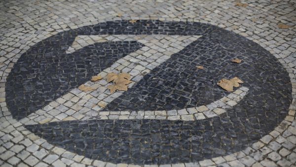 The logo of Swiss insurance company Zurich on the sidewalk outside their office in Lisbon, Portugual Wednesday, Sept. 16, 2020. (AP Photo/Armando Franca) - Sputnik International