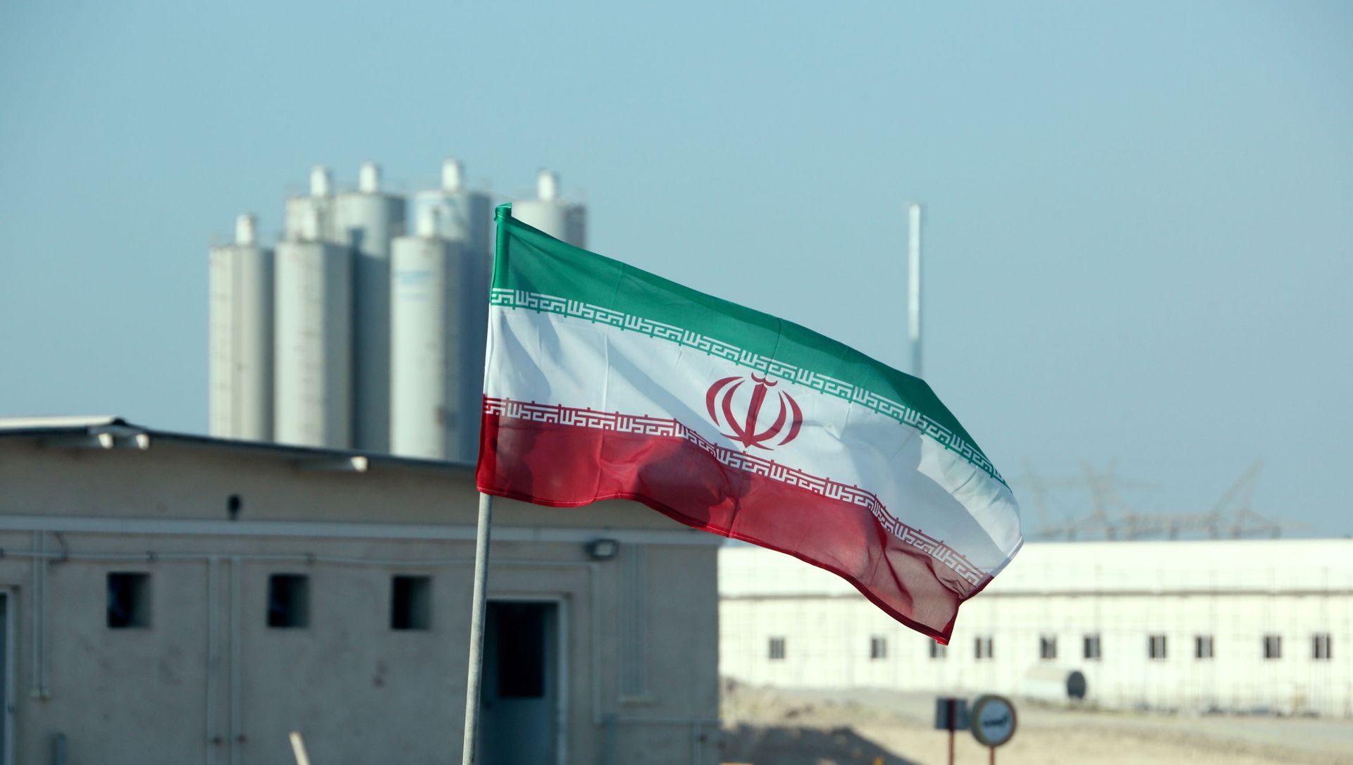 A picture taken on November 10, 2019, shows an Iranian flag in Iran's Bushehr nuclear power plant, during an official ceremony to kick-start works on a second reactor at the facility. - Bushehr is Iran's only nuclear power station and is currently running on imported fuel from Russia that is closely monitored by the UN's International Atomic Energy Agency. A picture taken on November 10, 2019, shows an Iranian flag in Iran's Bushehr nuclear power plant, during an official ceremony to kick-start works on a second reactor at the facility. - Bushehr is Iran's only nuclear power station and is currently running on imported fuel from Russia that is closely monitored by the UN's International Atomic Energy Agency. - Sputnik International, 1920, 15.02.2021
