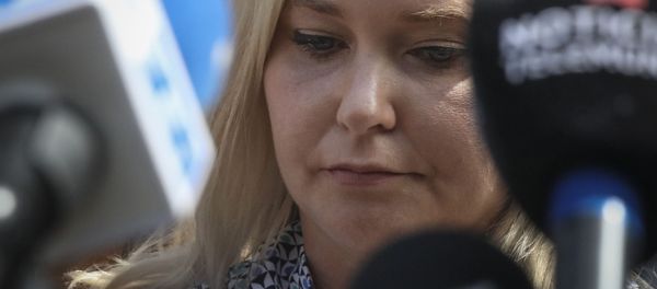 In this 27 August 2019, photo, Virginia Roberts Giuffre, who says she was trafficked by sex offender Jeffrey Epstein, holds a news conference outside a Manhattan court where sexual assault claimants invited by a judge addressed a hearing following Epstein's jailhouse death in New York - Sputnik International
