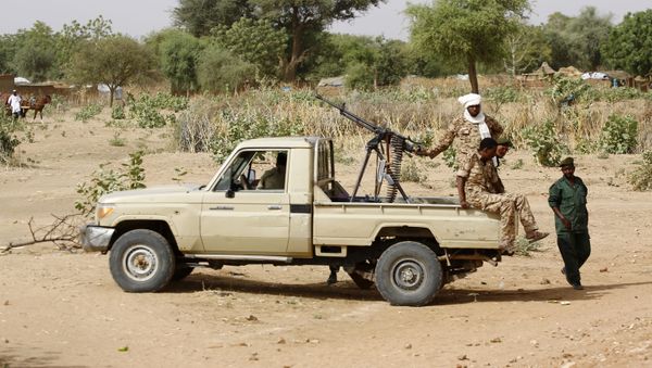 In this file photo taken on April 2, 2016, A convoy of Sudanese security forces deploy during a rally in al-Geneina, the capital of the West Darfur state.  - Sputnik International