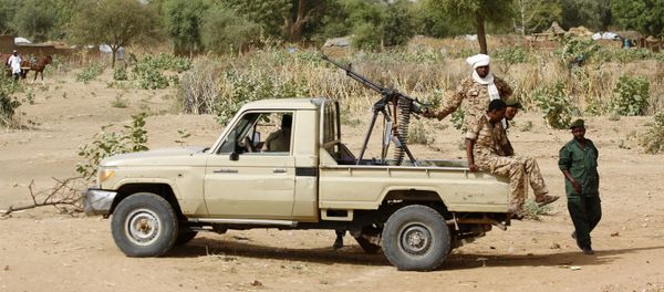 In this file photo taken on April 2, 2016, A convoy of Sudanese security forces deploy during a rally in al-Geneina, the capital of the West Darfur state.  - Sputnik International