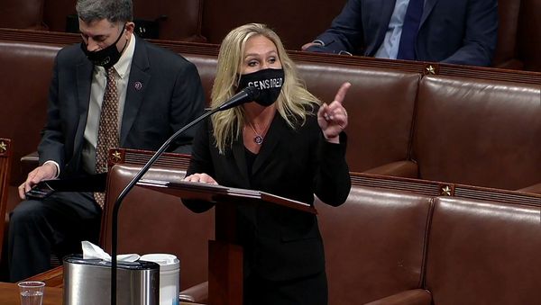 U.S. Rep. Marjorie Taylor Greene (R-GA) speaks during a debate ahead of a House of Representatives vote on impeachment against U.S. President Donald Trump for his role in last week's siege of the U.S. Capitol, formally charging Trump with inciting insurrection in a speech shortly before the riot, in this frame grab from video shot inside the House Chamber of the Capitol in Washington, US 13 January 2021. House TV via REUTERS - Sputnik International