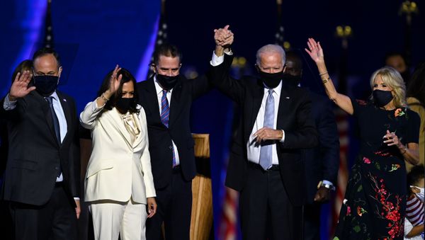 (From L) Husband of Vice President-elect Kamala Harris, Douglas Emhoff, Vice President-elect Kamala Harris, Hunter Biden, US President-elect Joe Biden and wife Jill Biden salute the crowd after delivering remarks in Wilmington, Delaware, on November 7, 2020, after being declared the winners of the presidential election. (Photo by Jim WATSON / AFP) - Sputnik International