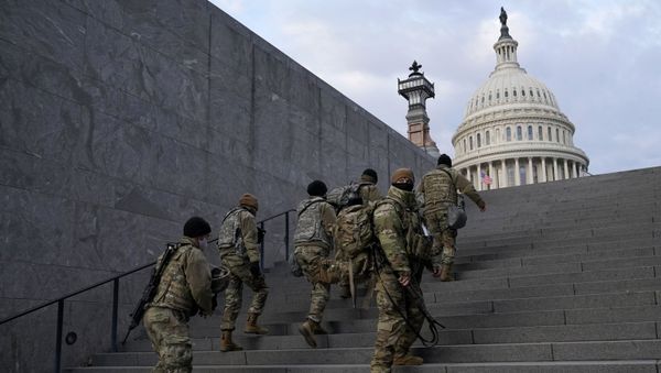 National Guard members take a staircase toward the U.S. Capitol building before a rehearsal for President-elect Joe Biden's Presidential Inauguration in Washington, Monday, Jan. 18, 2021 National Guard members take a staircase toward the U.S. Capitol building before a rehearsal for President-elect Joe Biden's Presidential Inauguration in Washington, Monday, Jan. 18, 2021 - Sputnik International