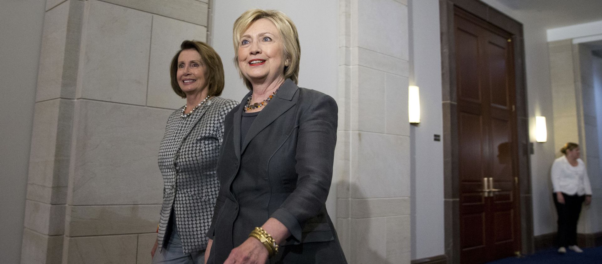 Democratic presidential candidate Hillary Clinton walks with House Minority Leader Nancy Pelosi of Calif. as they arrive for a meeting with the House Democratic Caucus, Wednesday, June 22, 2016, on Capitol Hill in Washington. (AP Photo/Alex Brandon) Democratic presidential candidate Hillary Clinton walks with House Minority Leader Nancy Pelosi of Calif. as they arrive for a meeting with the House Democratic Caucus, Wednesday, June 22, 2016, on Capitol Hill in Washington. (AP Photo/Alex Brandon) - Sputnik International, 1920, 19.01.2021
