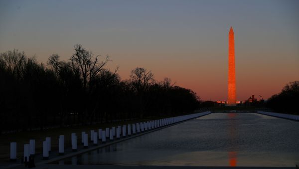 The sun sets on the National Mall ahead of U.S. President-elect Joe Biden's remarks at the Lincoln Memorial in Washington, U.S. January 19, 2021. - Sputnik International