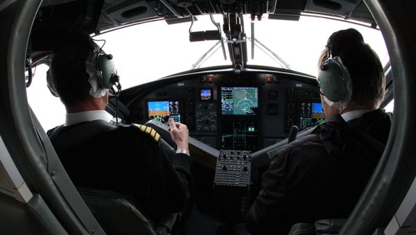 A view of the cockpit of the Aurora airlines' DHC-6 Twin Otter 400, flying over the Vladivostok-Kavalerovo-Vladivostok route - Sputnik International