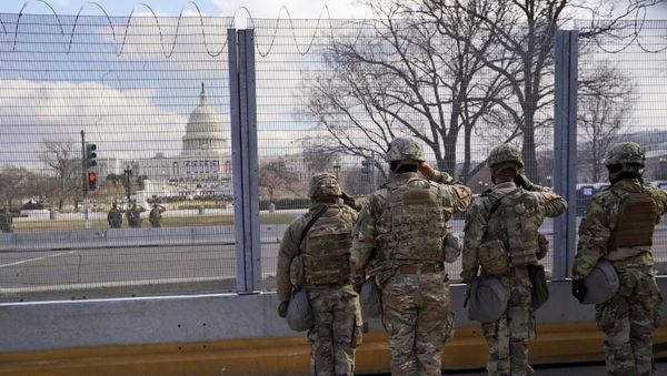 National Guard members salute in front of the U.S. Capitol building during the inauguration of President-elect Joe Biden in Washington, U.S., 20 January 2021. National Guard members salute in front of the U.S. Capitol building during the inauguration of President-elect Joe Biden in Washington, U.S., 20 January 2021. - Sputnik International
