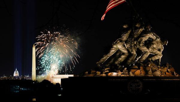 Fireworks are seen over the National Mall during the Celebrating America event at the Lincoln Memorial in Washington, after the inauguration of Joe Biden as the 46th President of the United States, in U.S., January 20, 2021 - Sputnik International