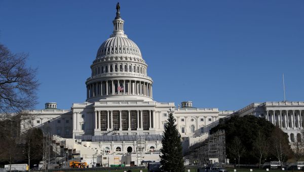 Construction for the upcoming presidential inauguration ceremony is seen outside of the U.S. Capitol Building in Washington, U.S., December 28, 2020. - Sputnik International