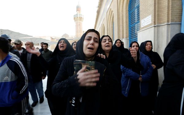 Mourners carry the coffin of a man who was killed in a twin suicide bombing attack in a central Baghdad market, during his funeral in Baghdad, Iraq January 21, 2021. - Sputnik International