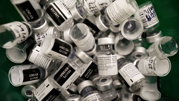 FILE PHOTO: Discarded vials of vaccinations against the coronavirus disease (COVID-19) are seen as Israel continues its national vaccination drive, during a third national COVID lockdown, at a Maccabi Healthcare Services branch in Ashdod, Israel December 29, 2020.  - Sputnik International
