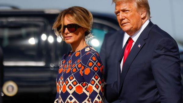 U.S. President Donald Trump and first lady Melania Trump arrive at Palm Beach International Airport in West Palm Beach, Florida, U.S., January 20, 2021 - Sputnik International