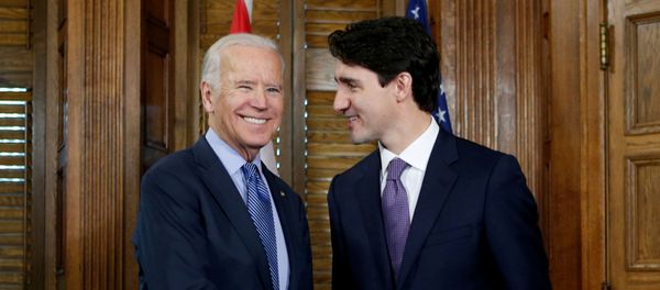 Canada's Prime Minister Justin Trudeau (R) shakes hands with U.S. Vice President Joe Biden during a meeting in Trudeau's office on Parliament Hill in Ottawa, Ontario, Canada, December 9, 2016. Canada's Prime Minister Justin Trudeau (R) shakes hands with U.S. Vice President Joe Biden during a meeting in Trudeau's office on Parliament Hill in Ottawa, Ontario, Canada, December 9, 2016. - Sputnik International