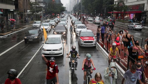 People participate in a demonstration to protest against Brazil's President Jair Bolsonaro and his handling of the coronavirus disease (COVID-19) crisis, in Sao Paulo, Brazil January 23, 2021. - Sputnik International