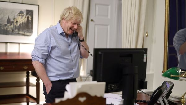British Prime Minister Boris Johnson speaks to U.S. President Joe Biden from London, Britain in this social media image obtained on January 23, 2021. - Sputnik International