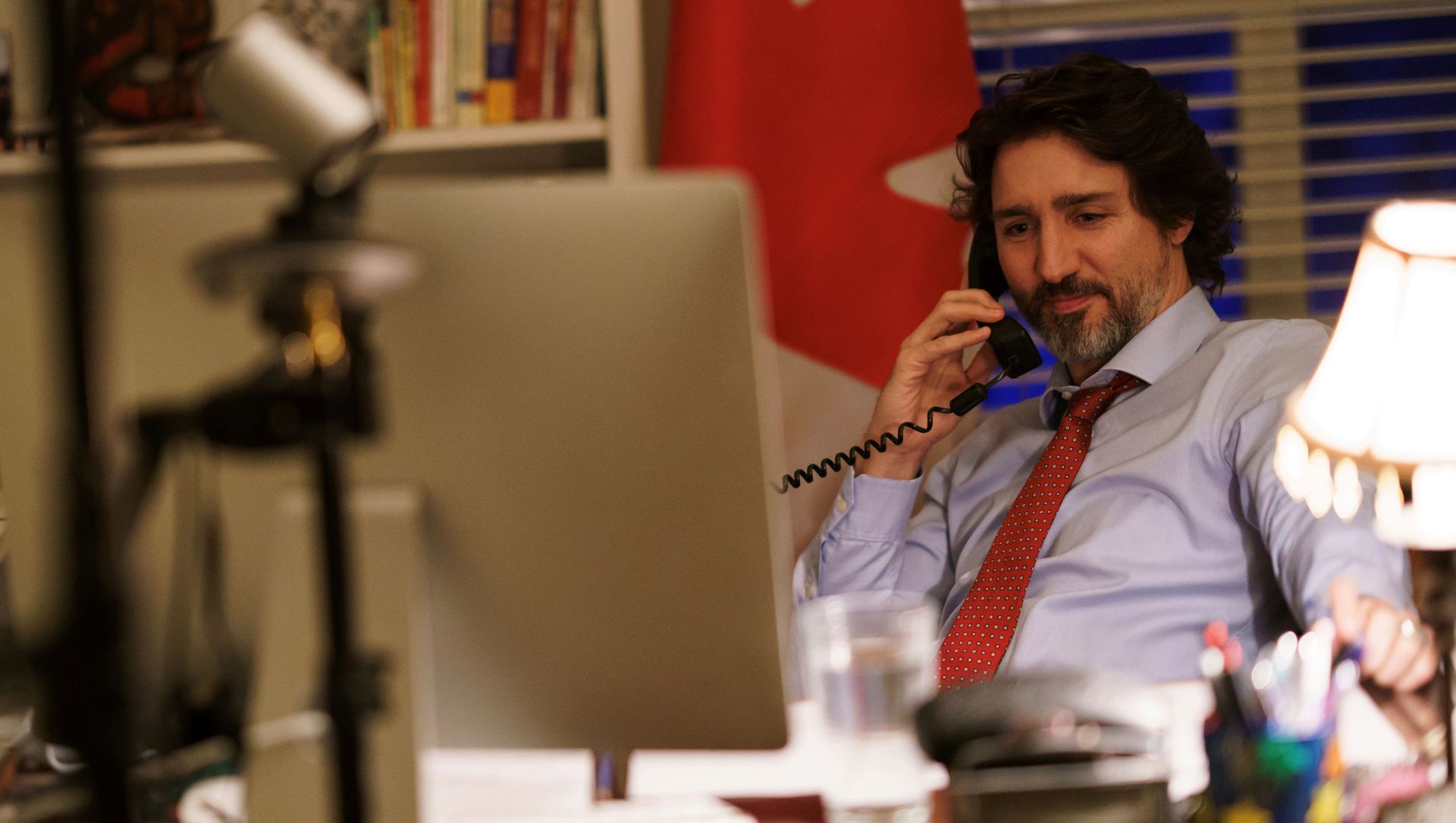 Canada's Prime Minister Justin Trudeau speaks on the phone with US President Joe Biden, who made the first call to a foreign leader following his inauguration, in Ottawa, Ontario, Canada, 22 January 2021. Canada's Prime Minister Justin Trudeau speaks on the phone with US President Joe Biden, who made the first call to a foreign leader following his inauguration, in Ottawa, Ontario, Canada, 22 January 2021. - Sputnik International, 1920, 23.02.2021