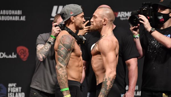 Dustin Poirier and Conor McGregor of Ireland face off during the UFC 257 weigh-in at Etihad Arena on UFC Fight Island on January 22, 2021 in Abu Dhabi, United Arab Emirates.  - Sputnik International