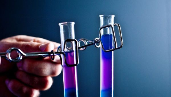  Two small test tubes held in spring clamps - Sputnik International