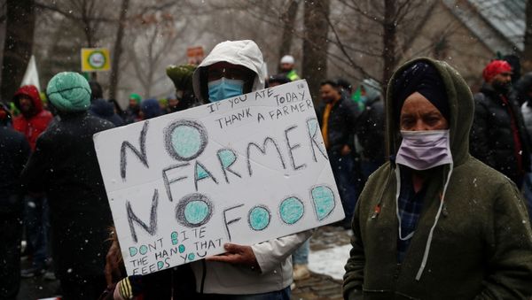 People demonstrate in solidarity with Indian famers protesting against agricultural reforms outside the Indian Consulate in the Manhattan borough of New York, U.S., January 26, 2021. - Sputnik International