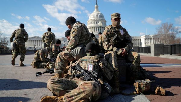 National Guard troops gather in front of the U.S. Capitol one day ahead of President-elect Joe Biden's Inauguration in Washington, U.S. January 19, 2021. REUTERS/Mike Segar/File Photo - Sputnik International