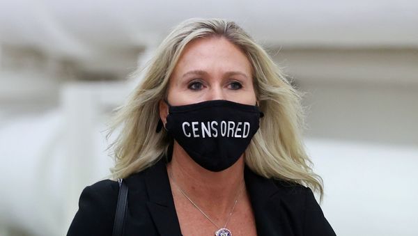 U.S. Representative Marjorie Taylor Greene (R-GA) wears a mask reading Censored as she walks to the House floor during debate on the second impeachment of President Donald Trump at the U.S. Capitol in Washington, U.S. January 13, 2021. REUTERS/Jonathan Ernst - Sputnik International