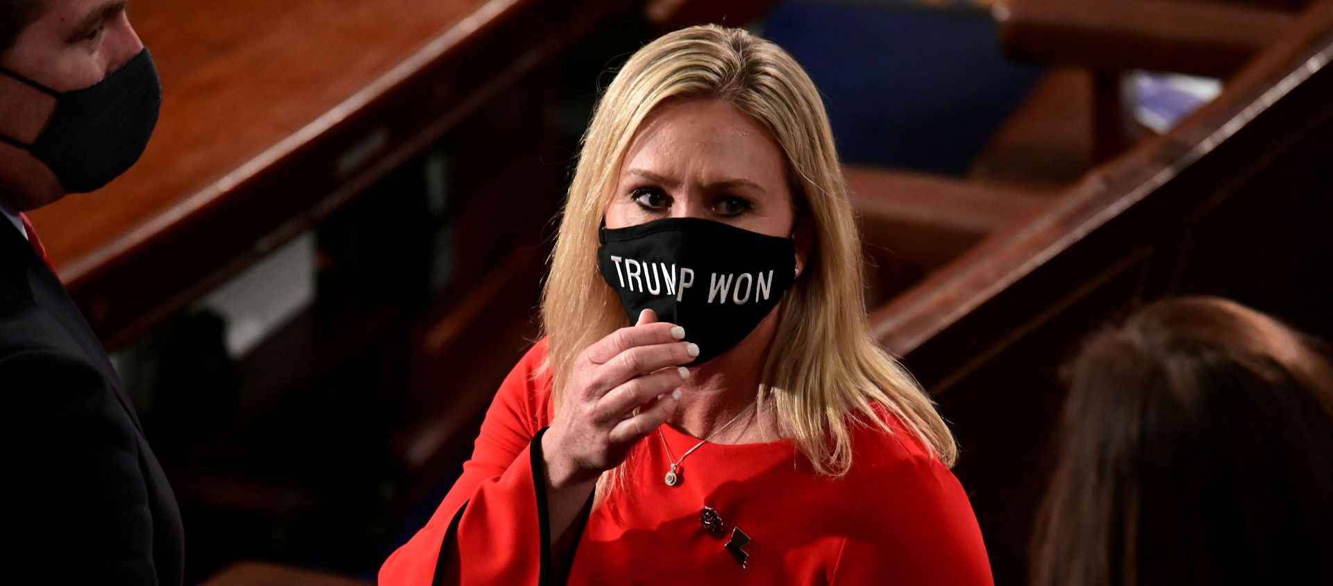 U.S. Rep. Marjorie Taylor Greene (R-GA) wears a Trump Won face mask as she arrives to take her oath of office as a member of the 117th Congress in Washington U.S. Rep. Marjorie Taylor Greene (R-GA) wears a Trump Won face mask as she arrives to take her oath of office as a member of the 117th Congress in Washington - Sputnik International, 1920, 30.01.2021
