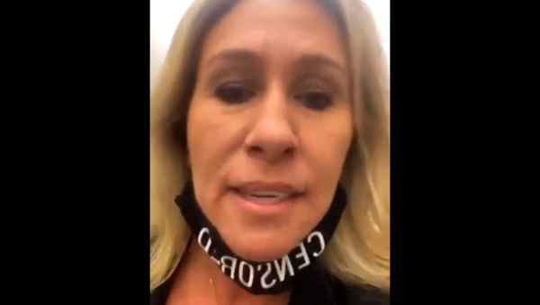 Screenshot from a video showing Republican Representative Marjorie Taylor Greene during an altercation with Democratic Representative Cori Bush in the Congress hallway - Sputnik International
