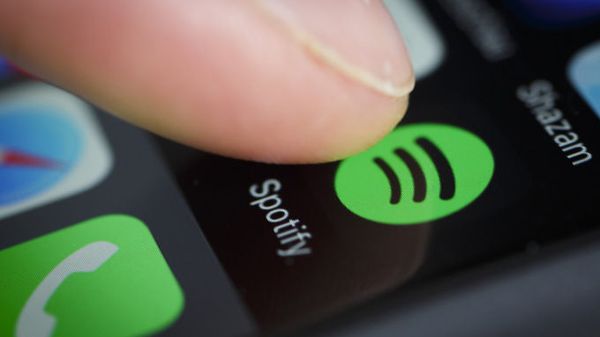 The Logo of streeming service Spotify is displayed on the screen of a smartphone on January 21, 2016 in Berlin, Germany - Sputnik International