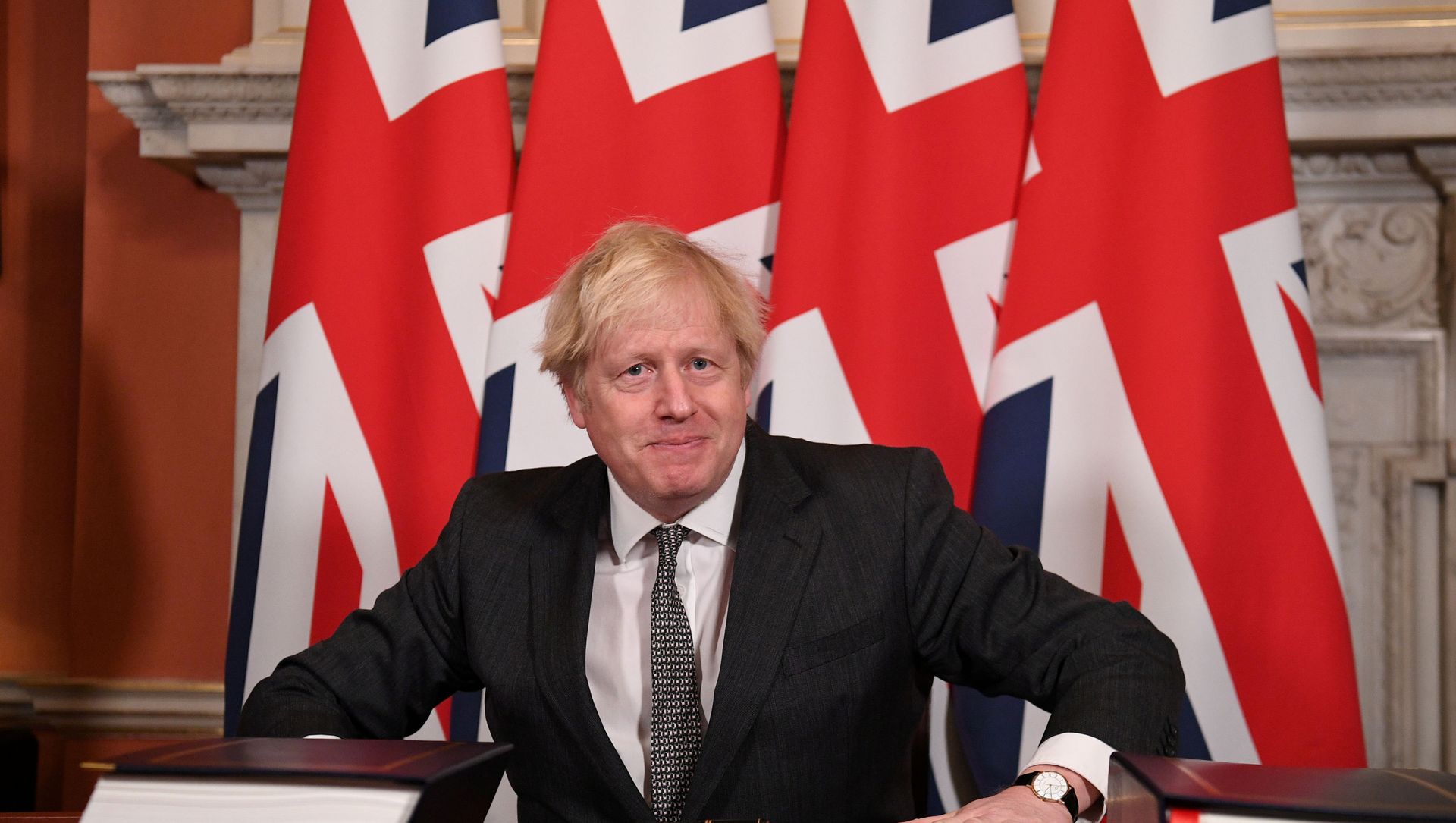 Britain's Prime Minister Boris Johnson reacts after signing the Brexit trade deal with the EU Britain's Prime Minister Boris Johnson reacts after signing the Brexit trade deal with the EU - Sputnik International, 1920, 08.02.2021