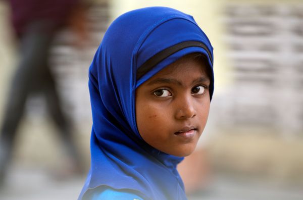 An ethnic Rohingya girl preparing for a midday prayer inside a community school in Klang, Myanmar. - Sputnik International
