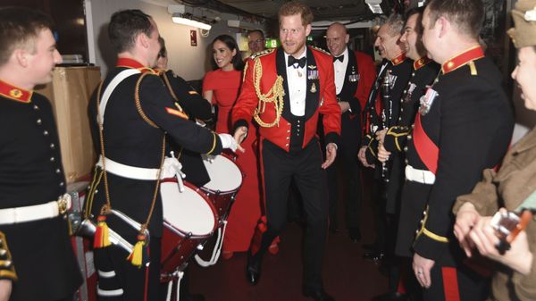 Britain's Prince Harry and Meghan, Duchess of Sussex, meet the Massed Bands of Her Majesty's Royal Marines at the Mountbatten Festival of Music at the Royal Albert Hall in London, Saturday, March 7, 2020 Britain's Prince Harry and Meghan, Duchess of Sussex, meet the Massed Bands of Her Majesty's Royal Marines at the Mountbatten Festival of Music at the Royal Albert Hall in London, Saturday, March 7, 2020 - Sputnik International