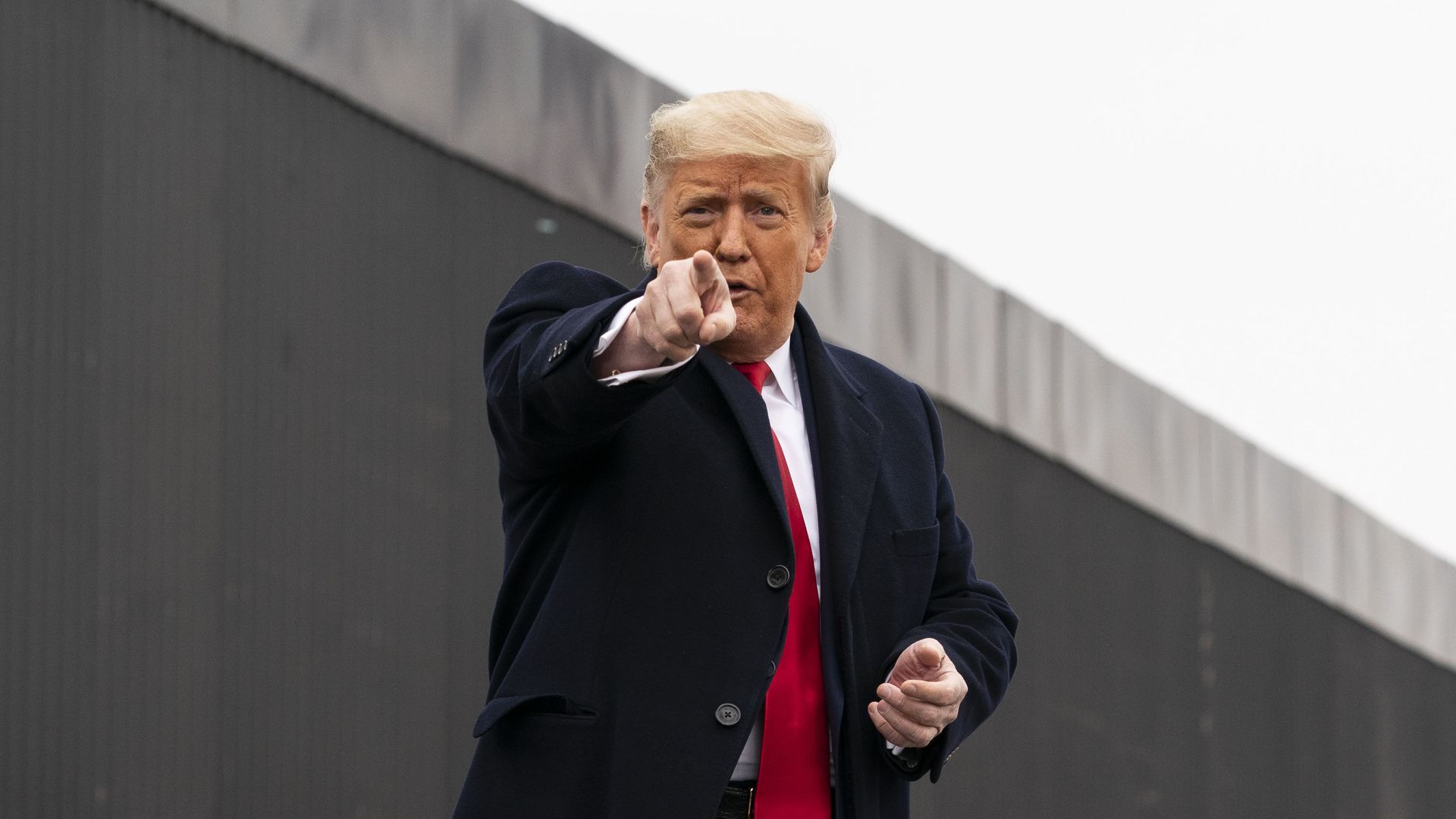 President Donald Trump points to a member of the audience after speaking near a section of the U.S.-Mexico border wall, Tuesday, Jan. 12, 2021, in Alamo, Texas President Donald Trump points to a member of the audience after speaking near a section of the U.S.-Mexico border wall, Tuesday, Jan. 12, 2021, in Alamo, Texas - Sputnik International, 1920, 03.02.2021