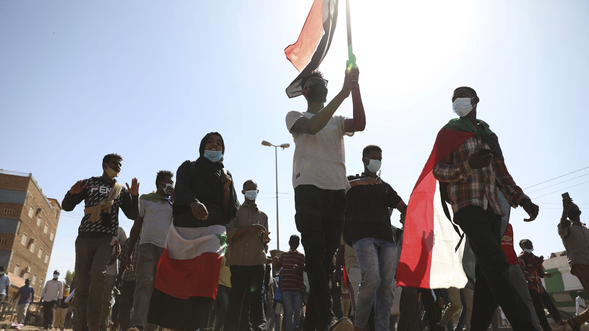 Protesters gather during a demonstration, in Khartoum, Sudan, Saturday, Dec. 19, 2020. Protests in Sudan’s capital and across the country are demanding a faster pace to democratic reforms, in demonstrations that are marking the two-year anniversary of the uprising that led to the military’s ouster of strongman Omar al-Bashir. Protesters gather during a demonstration, in Khartoum, Sudan, Saturday, Dec. 19, 2020. Protests in Sudan’s capital and across the country are demanding a faster pace to democratic reforms, in demonstrations that are marking the two-year anniversary of the uprising that led to the military’s ouster of strongman Omar al-Bashir. - Sputnik International, 1920, 01.02.2021